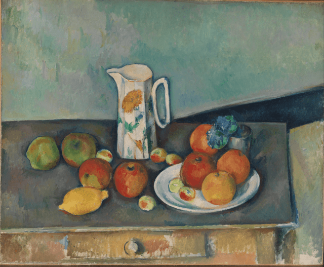 Still life painting by Paul Cezanne of fruit on a plate with a pitcher next to it.