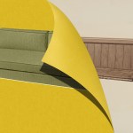 A green couch on a yellow paper being folded away to reveal a church pew