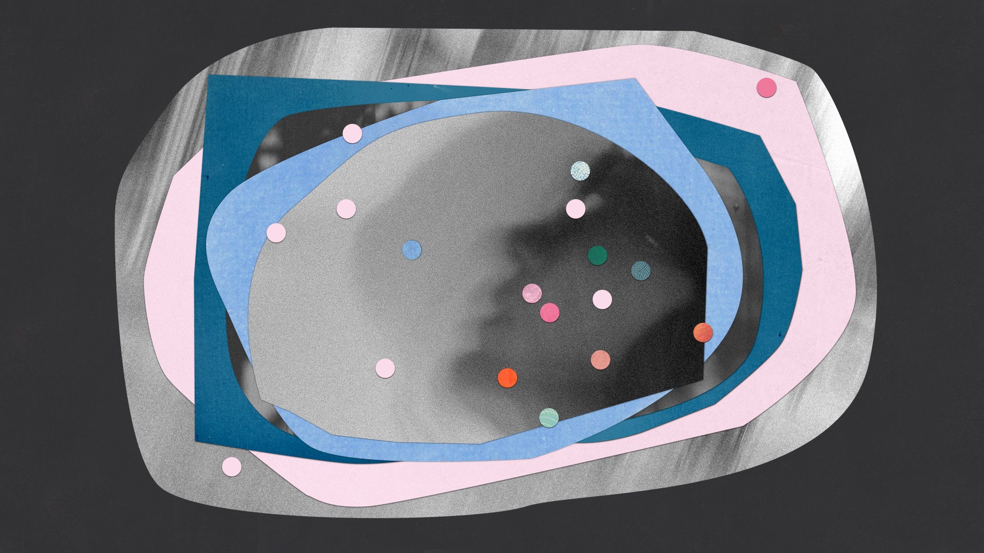 A baby with pink and blue circles.